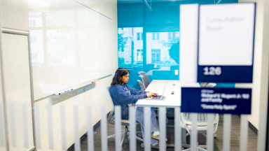 Library study room with tables and chairs